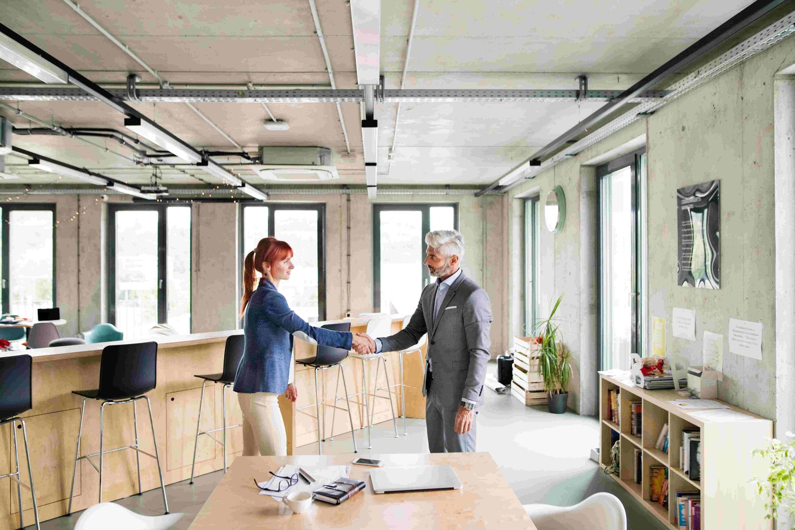 Two business partners shaking hands after a meeting
