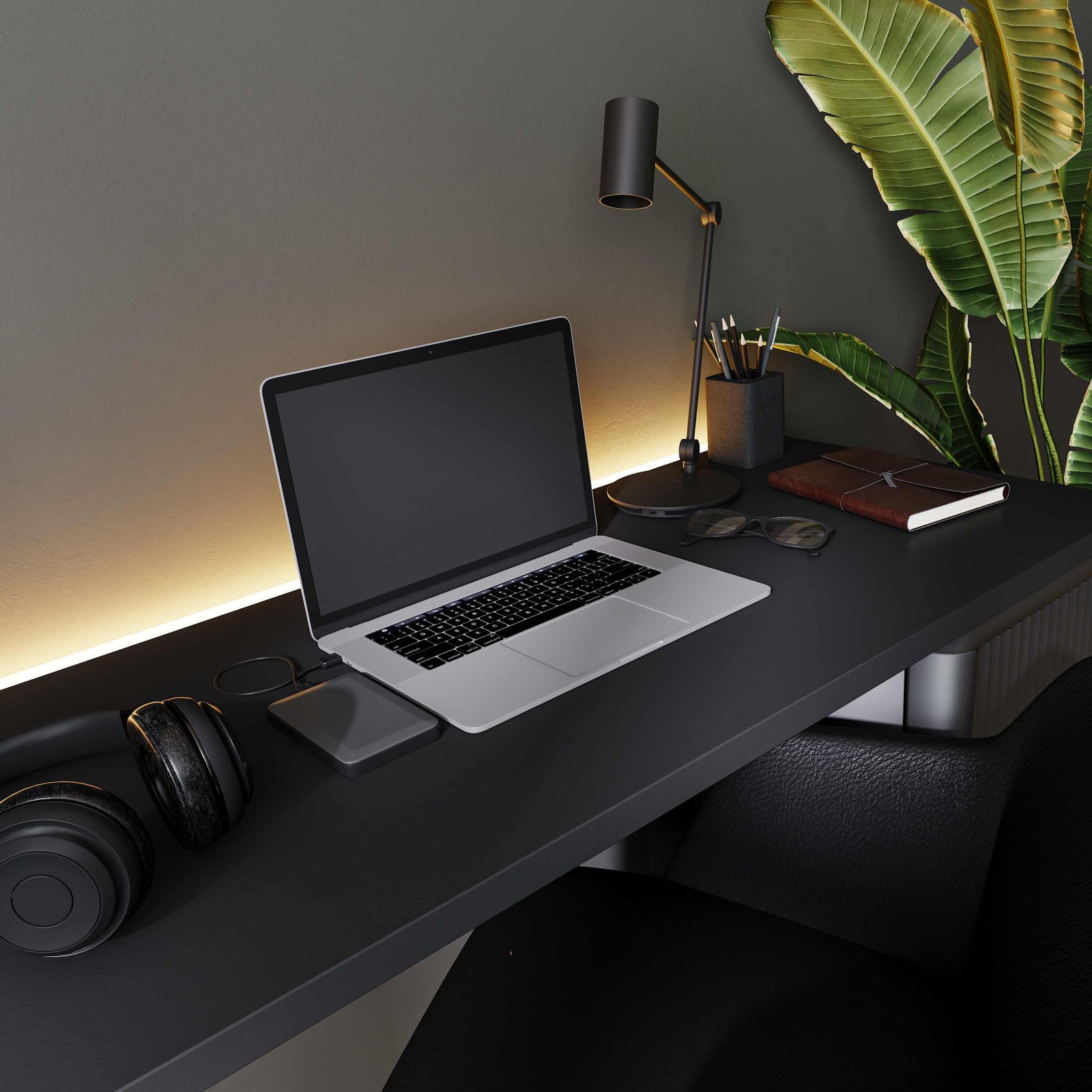 A dark studio desk set up for a website build